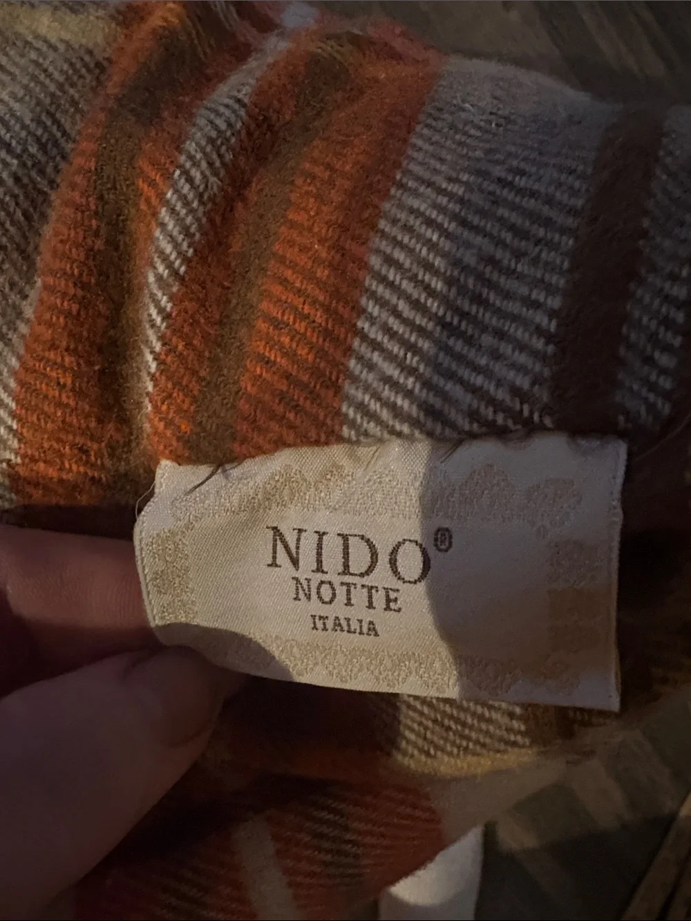 Nido plaid throw